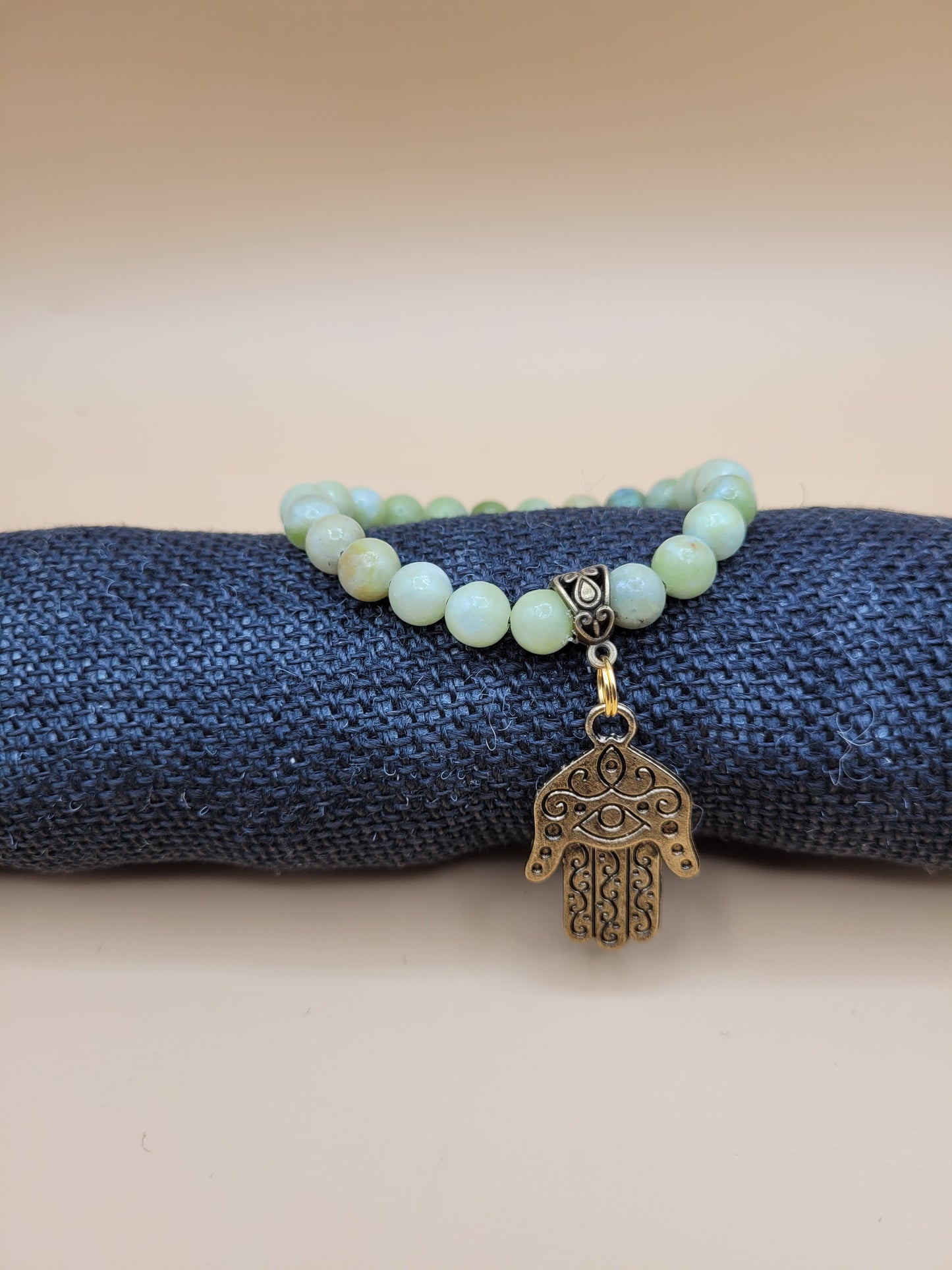 Jade Bead with Hand Pendant