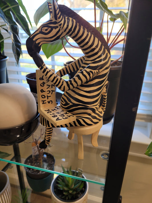 Sitting Zebra Teacher Sculpture